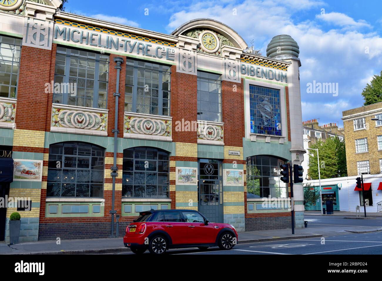 Red Mini in Front of Michelin House, Chelsea, London Stock Photo