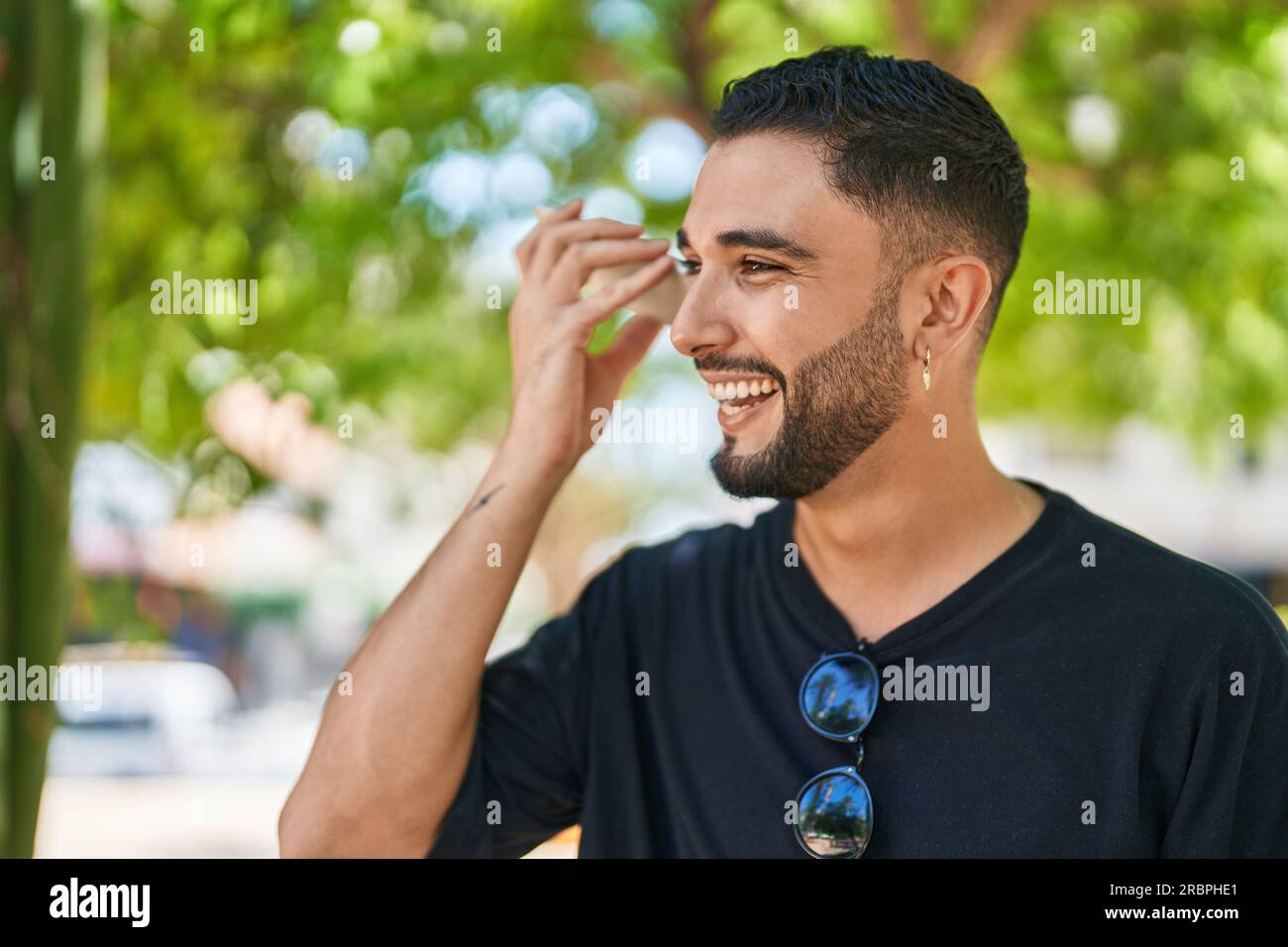 Young arab man miling confident hi-res stock photography and images - Alamy