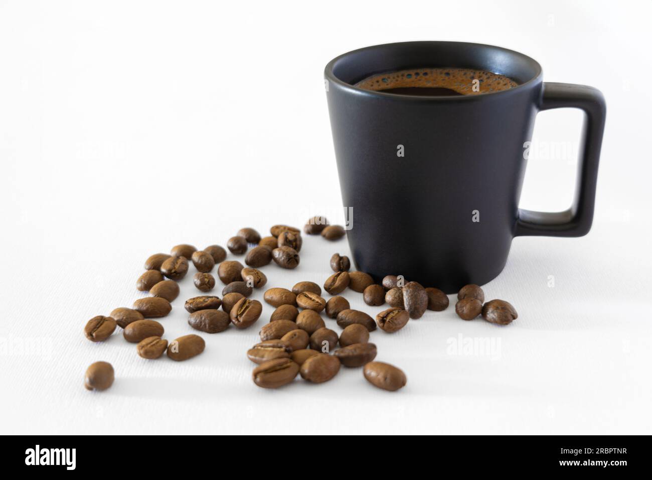 Coffee cup and coffee beans isolated on white background Stock Photo