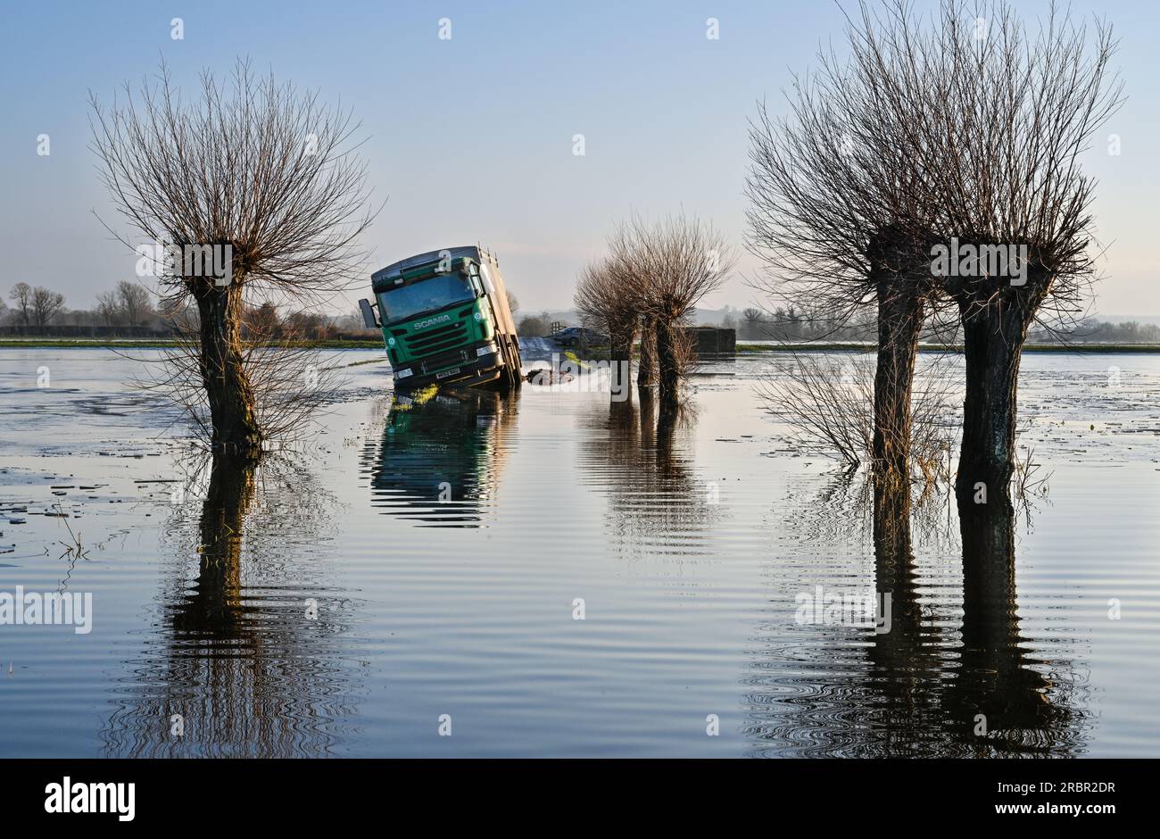 Stranded Lorry having driven off the road during flooding of the Somerset Levels at Godney near Glastonbury Somerset Stock Photo