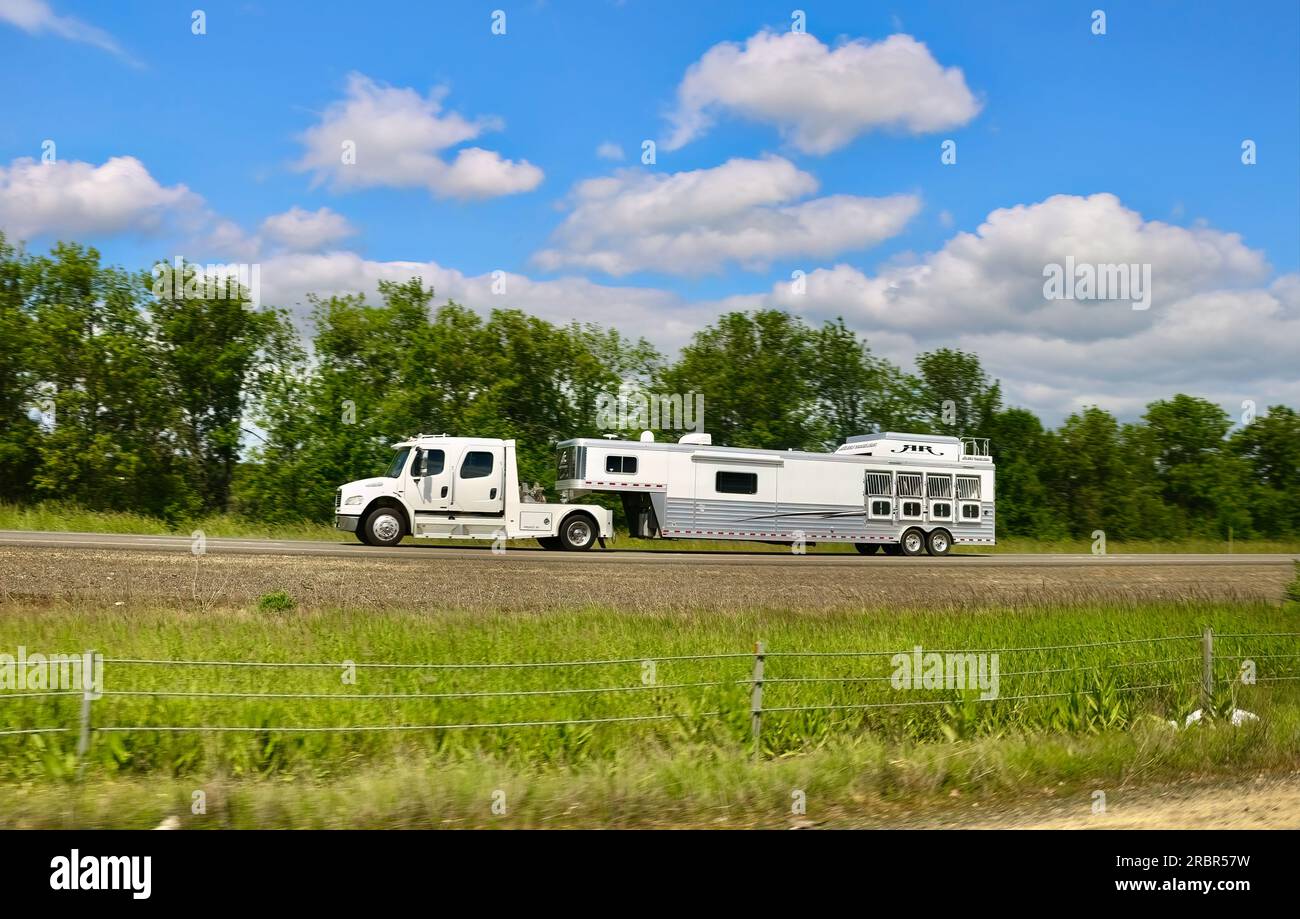 Truck with a 4 horse trailer driving south on Interstate 5 Oregon USA