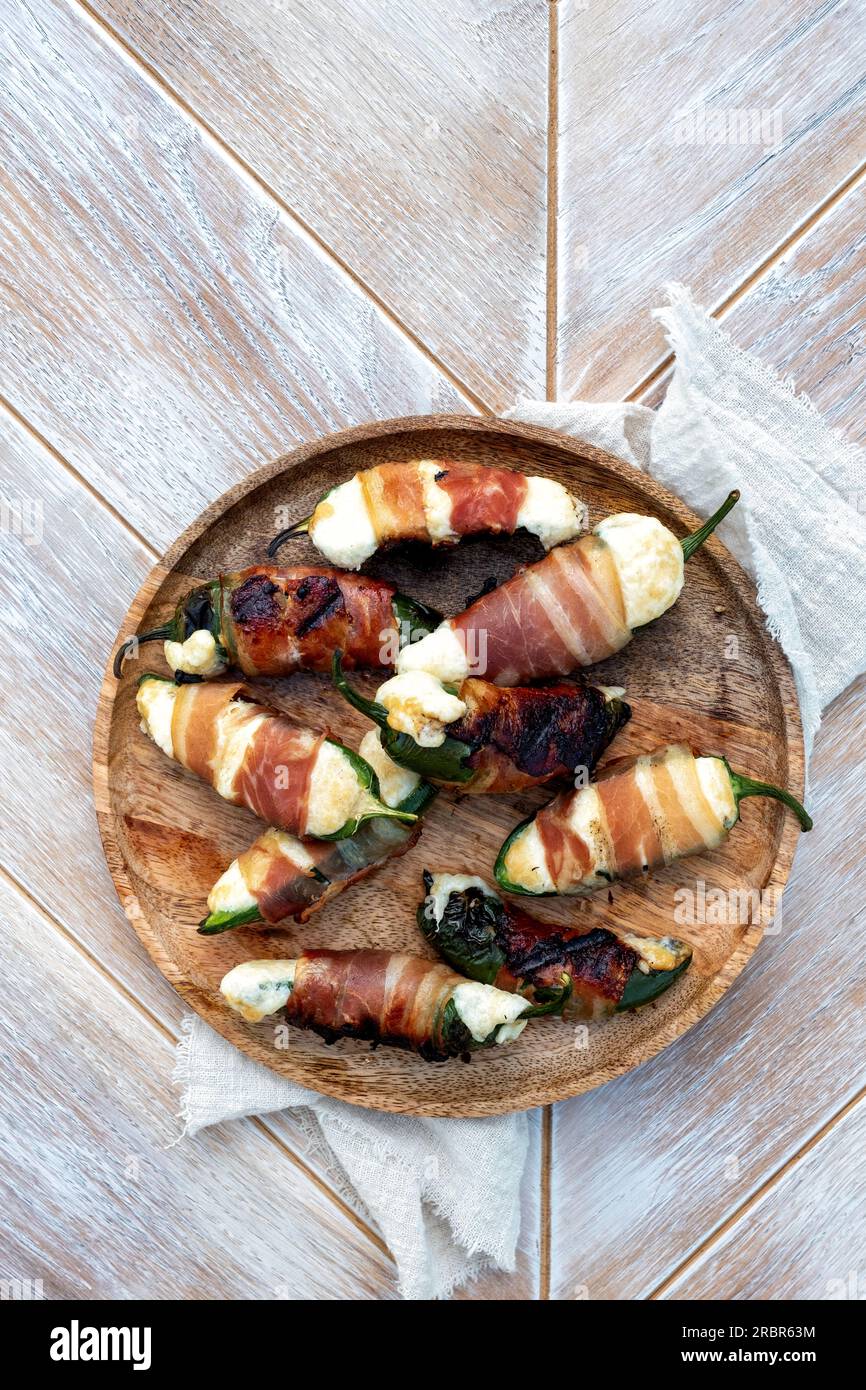 Homemade Bacon Wrapped Jalapeno Poppers with Cream Cheese Stock Photo