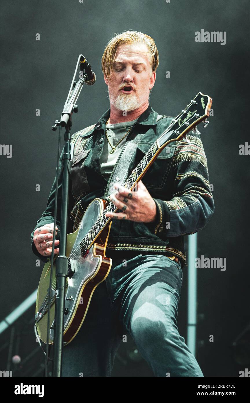 MADRID, MAD COOL FESTIVAL 2023, SPAIN:  Josh Homme, singer and guitarist of the American rock band Queen Of The Stone Age (also known as QOTSA,) performing live on stage at the Mad Cool Festival 2023. Stock Photo