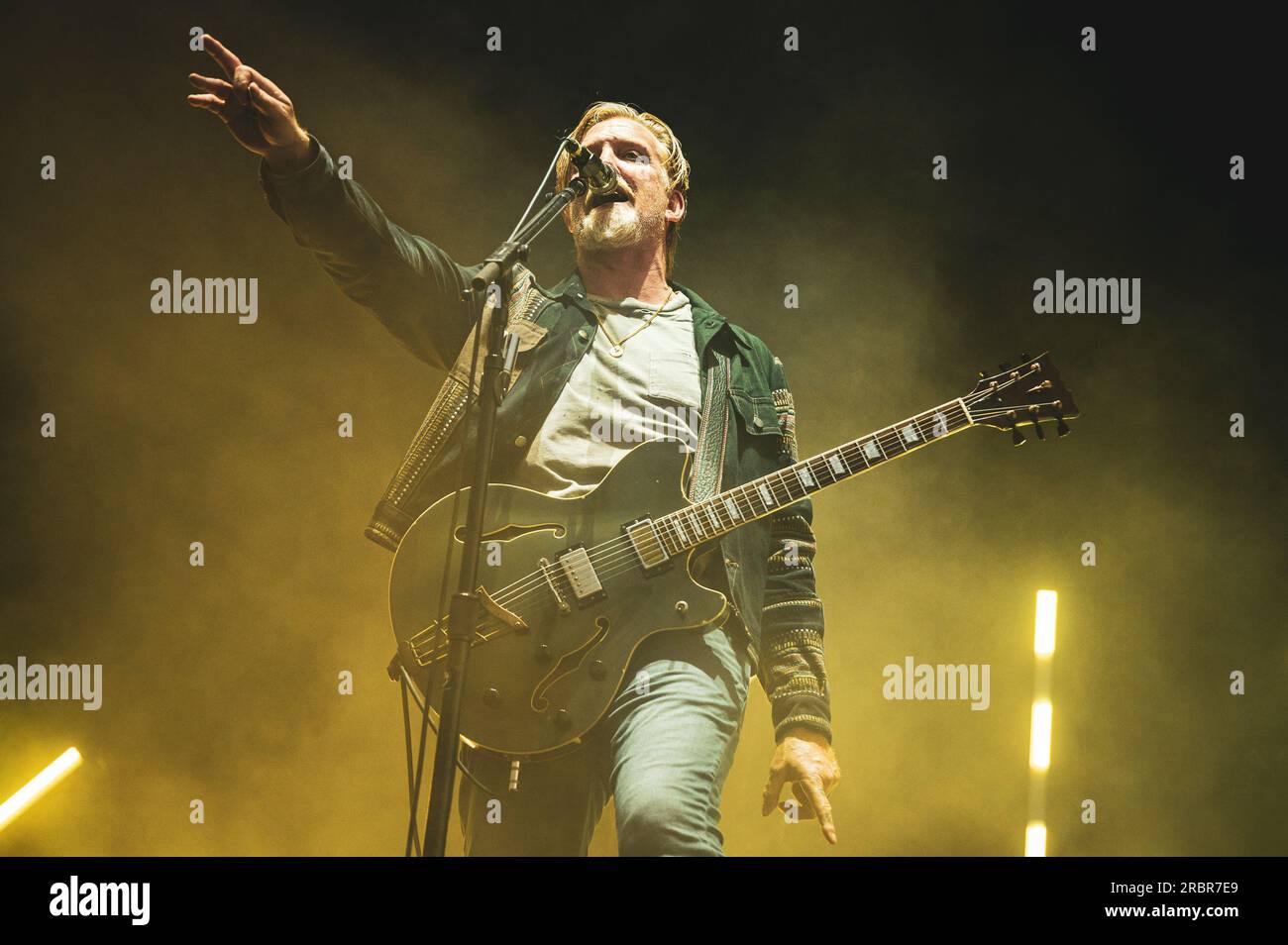 MADRID, MAD COOL FESTIVAL 2023, SPAIN:  Josh Homme, singer and guitarist of the American rock band Queen Of The Stone Age (also known as QOTSA,) performing live on stage at the Mad Cool Festival 2023. Stock Photo