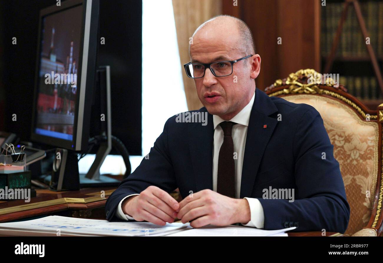 Moscow, Russia. 10th July, 2023. Head of the Udmurt Republic Alexander Brechalov listens during a face-to-face meeting with Russian President Vladimir Putin at the Kremlin, July 10, 2023 in Moscow, Russia. Credit: Alexander Kazakov/Kremlin Pool/Alamy Live News Stock Photo