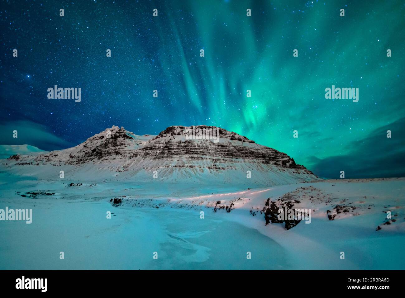 Aurora Borealis over Icelandic mountains, Iceland Stock Photo - Alamy