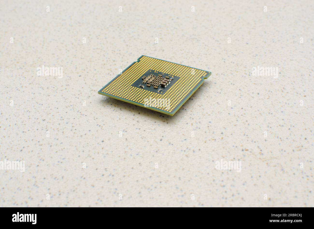 Detail of a powerful computer processor on a light surface ...