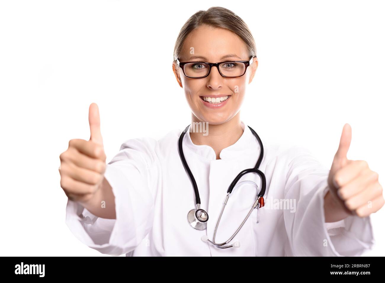 Motivated attractive female doctor or nurse in a white coat and
