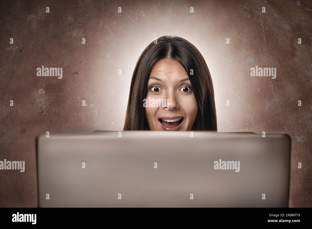 Woman shocked computer screen hi-res stock photography and images - Alamy