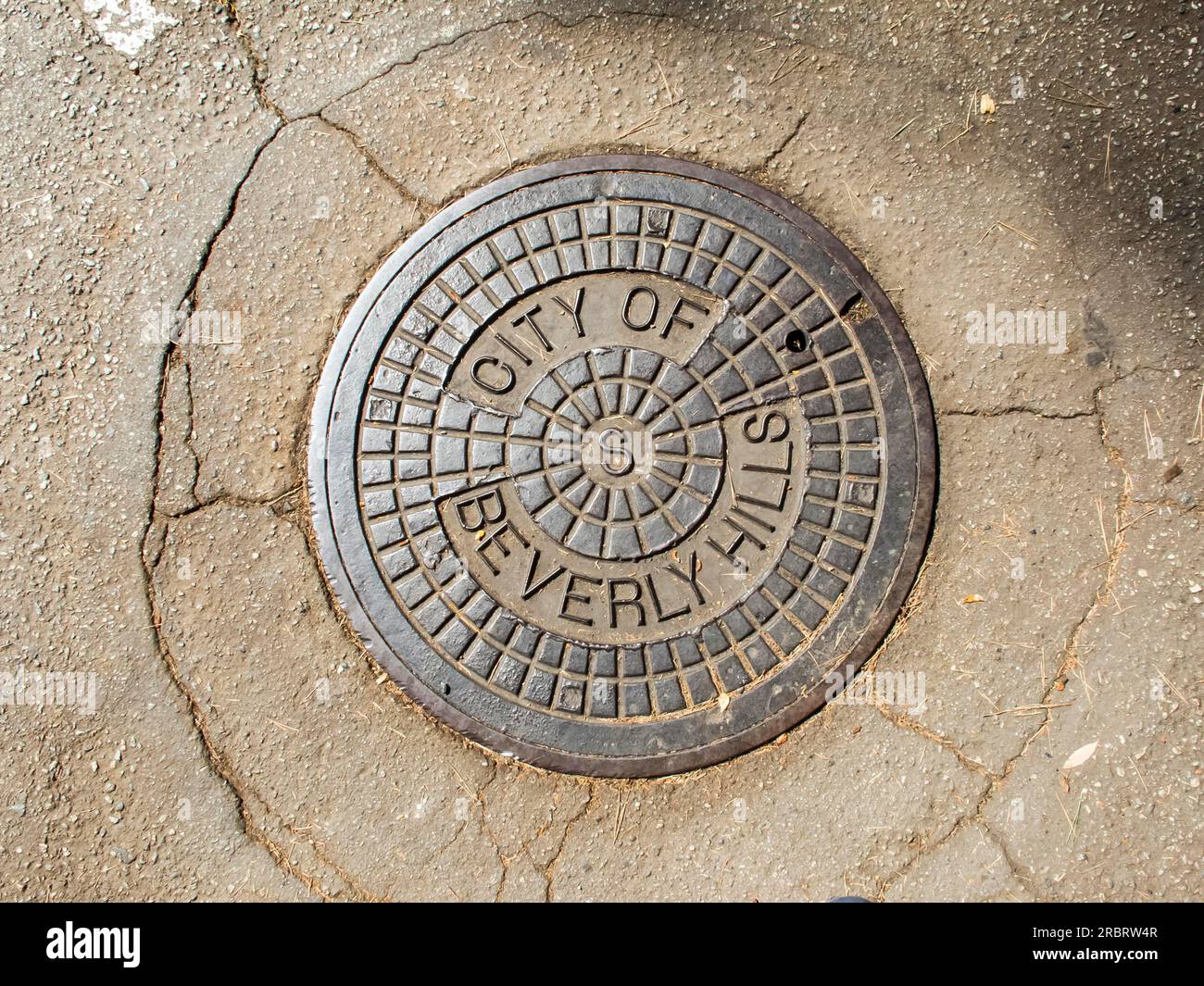 Manhole cover in Beverly Hills, CA Stock Photo