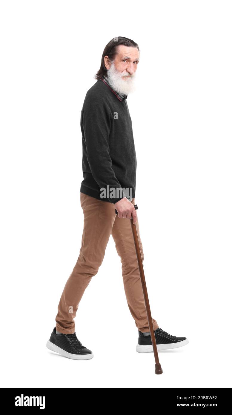 Senior man with walking cane on white background Stock Photo - Alamy