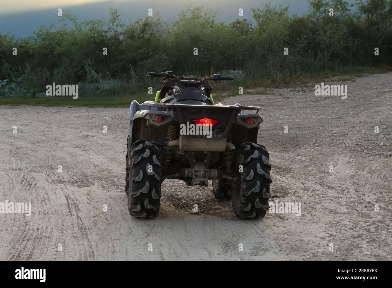 Modern fast quad bike on pathway outdoors Stock Photo Alamy