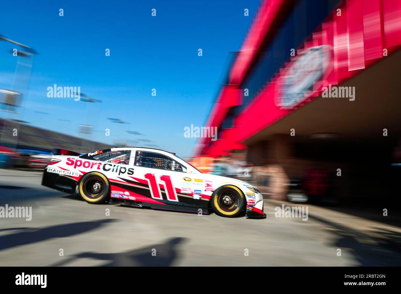 Fontana, CA, Mar 21, 2015: Denny Hamlin (11) takes to the track to practice for the Auto Club 400 at Auto Club Speedway in Fontana, CA Stock Photo