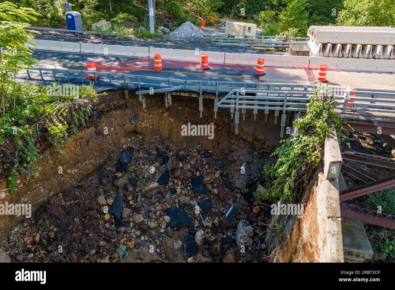 Rainwater that fell down Bear Mountain eroded the dirt and rocks that