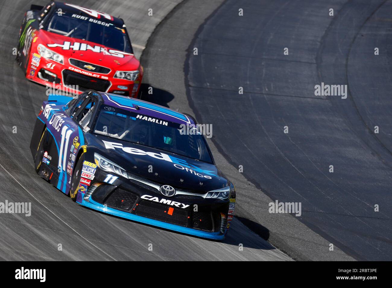 Dover, DE, May 15, 2016: Denny Hamlin (11) brings his race car through the turns during the AAA 400 Benefiting Autism Speaks at the Dover Stock Photo