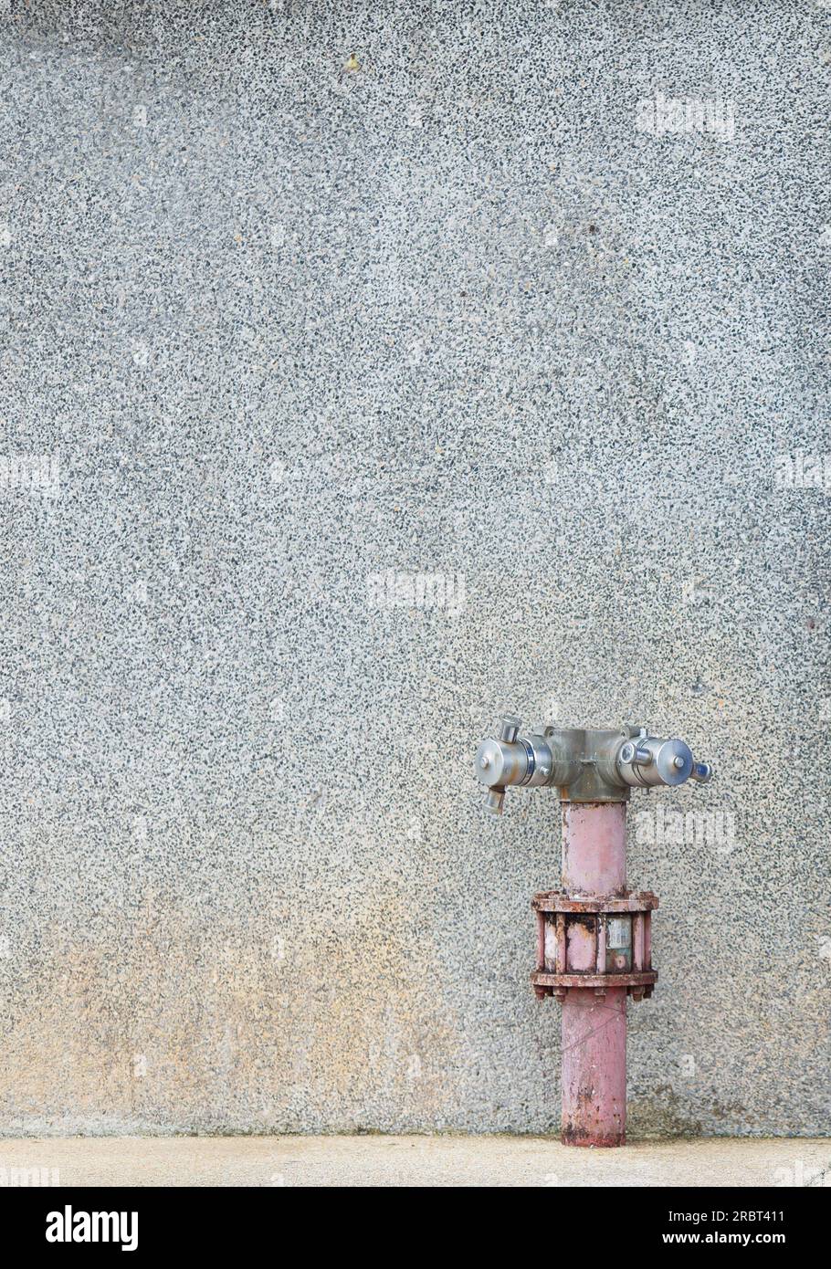 Fire hose point Installed on a dotted plaster wall The appearance of