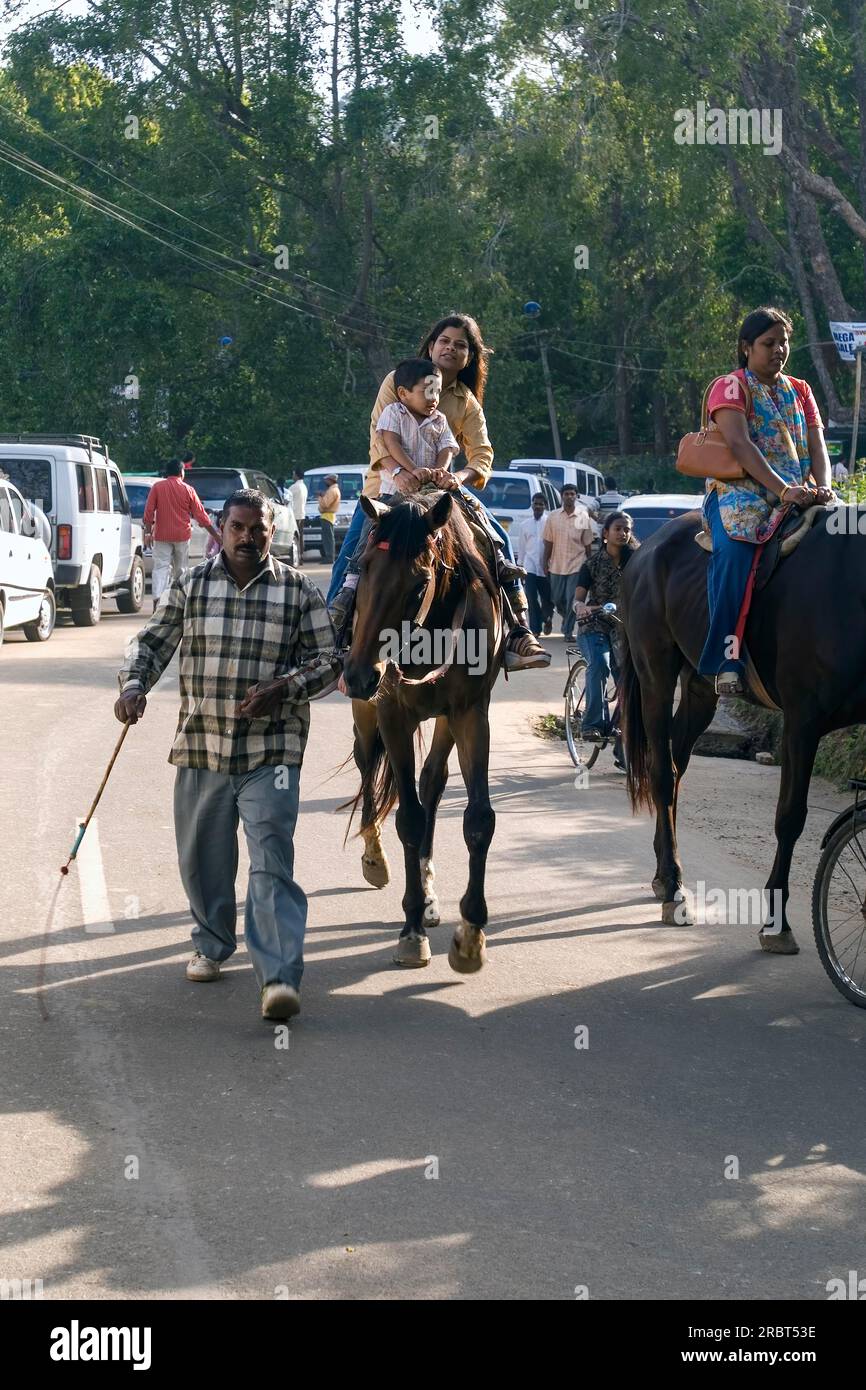 Tourists riding horse at Kodaikanal, Tamil Nadu, South India, India