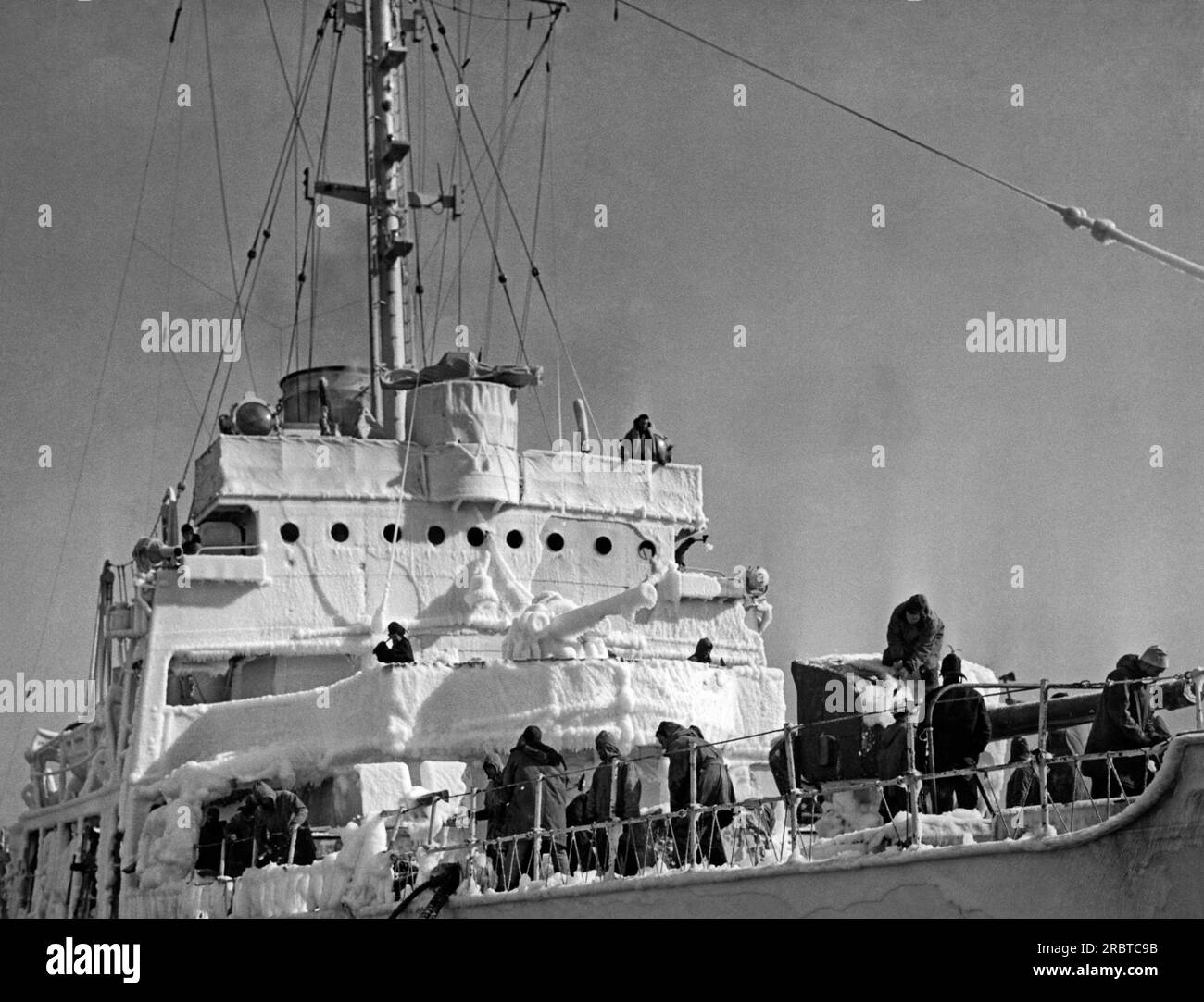 Atlantic Ocean, circa 1944 A Coast Guard ship in the North Atlantic showing the extreme ice and cold condtions they must deal with. Stock Photo