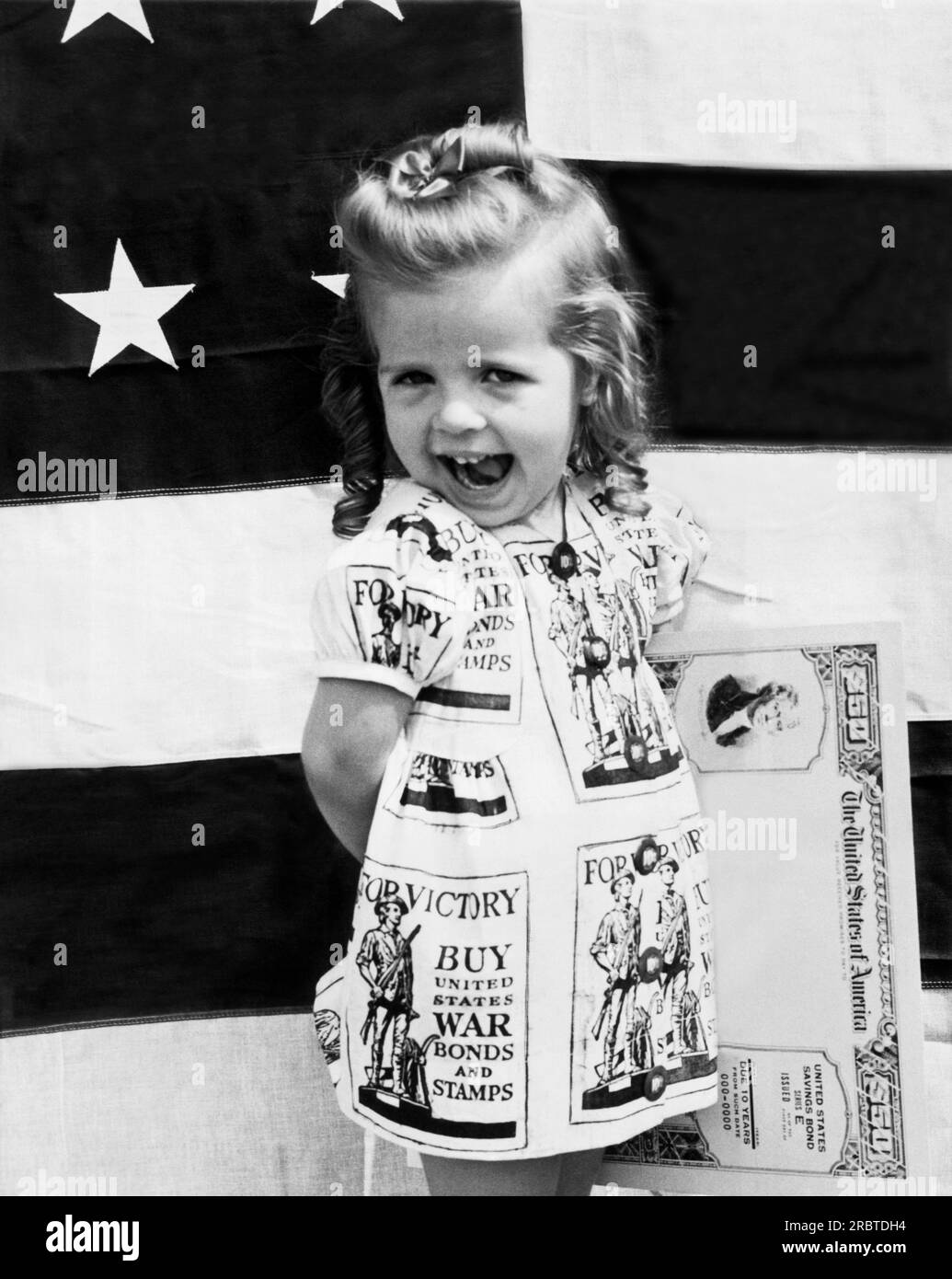 Chicago, Illinois:  August 10, 1943 Ann Fletchall, a three year old 'Minute Girl' advises everyone to buy War Bonds in the coming third War Loan drive. Stock Photo