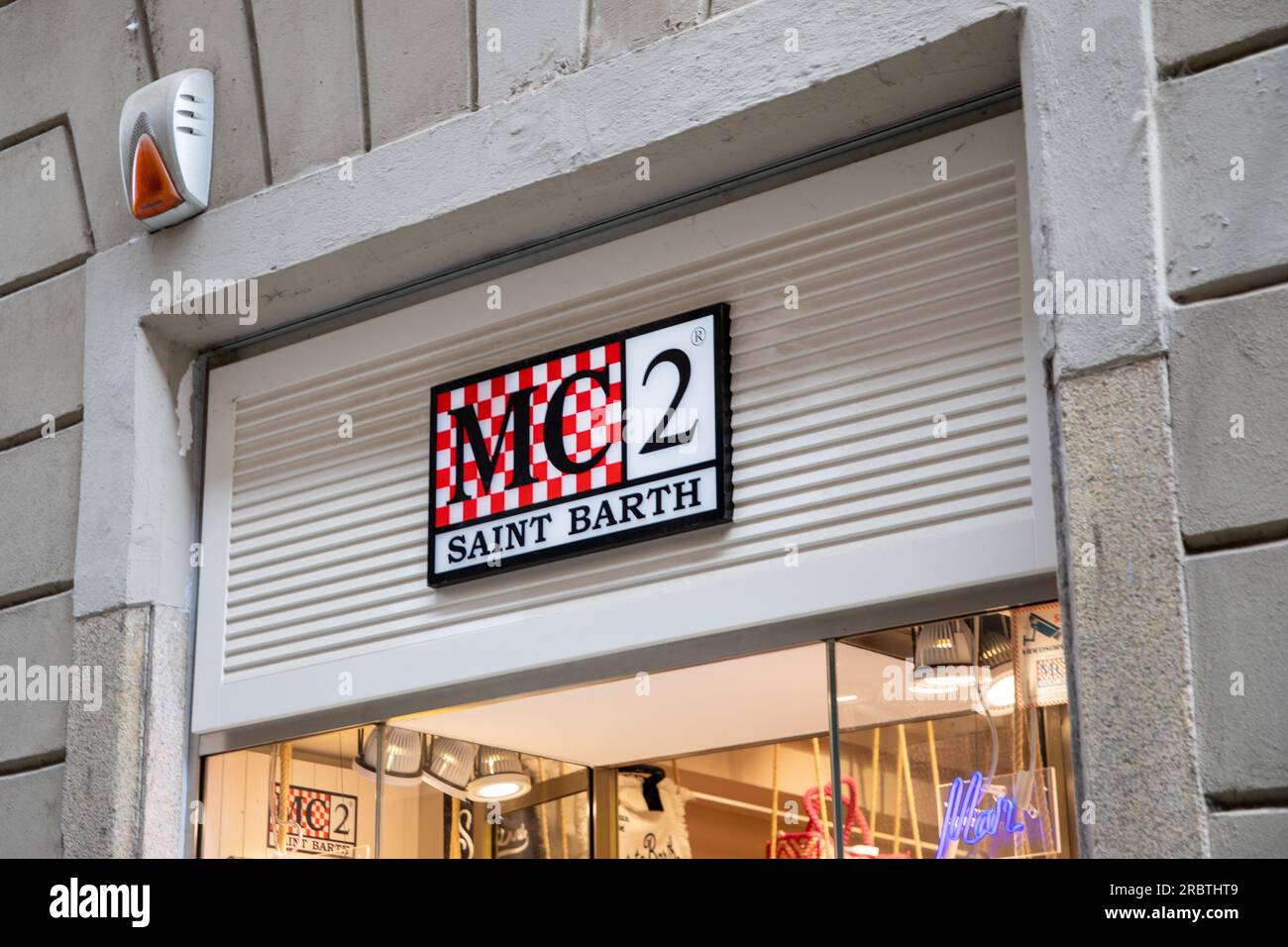 Designer clothing and jewelry boutiques in modern shopping plaza Gustavia  St Barts Stock Photo - Alamy