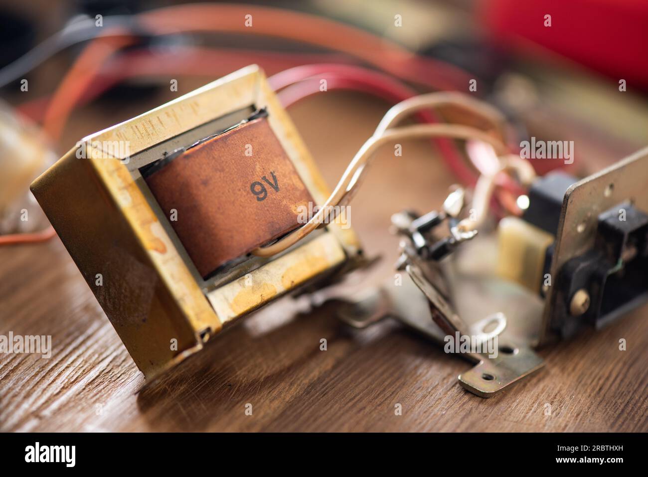 An old Laminated core transformer used to convert mains voltage to low voltage to power