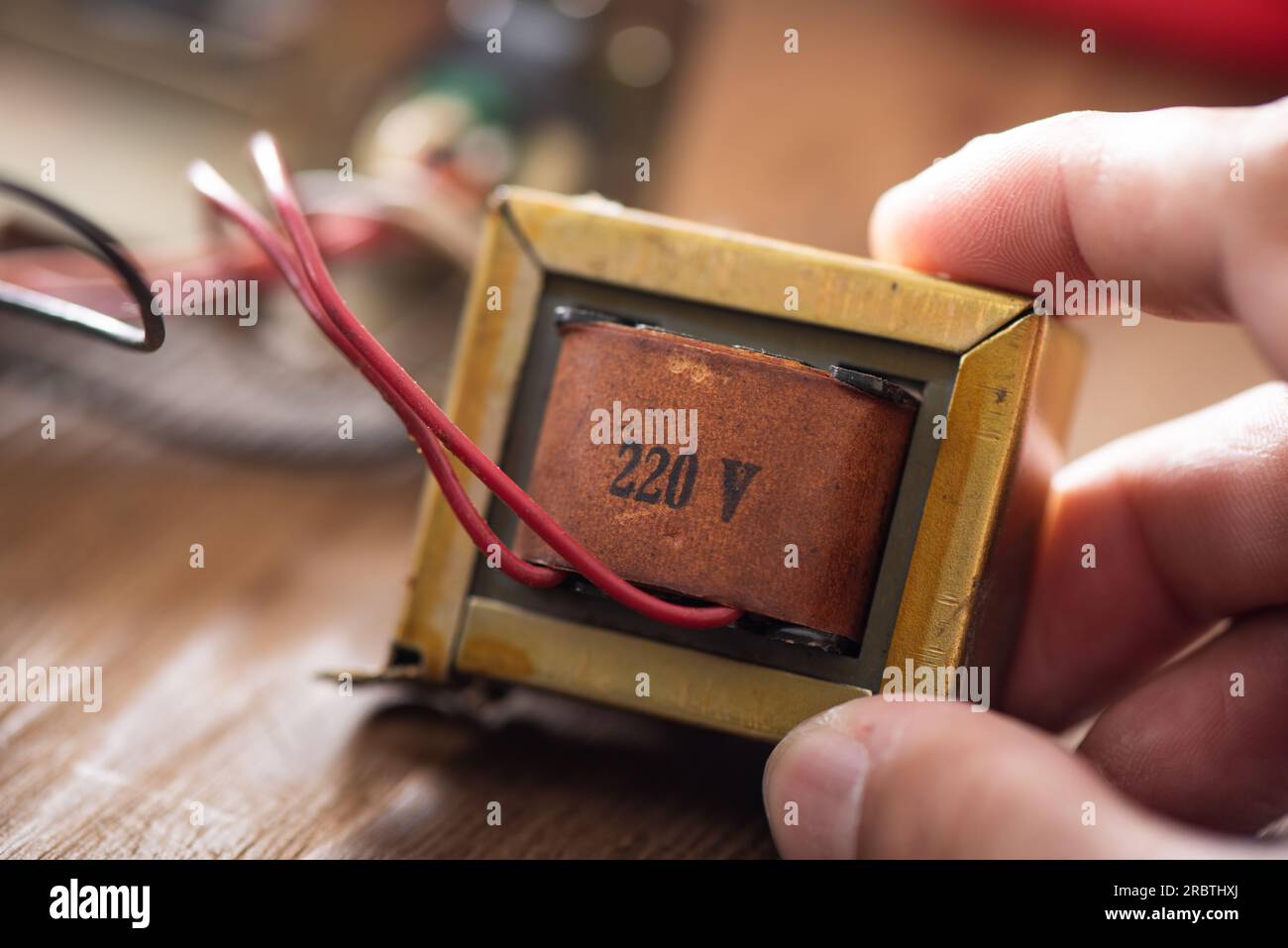 An old Laminated core transformer used to convert mains voltage to low voltage to power
