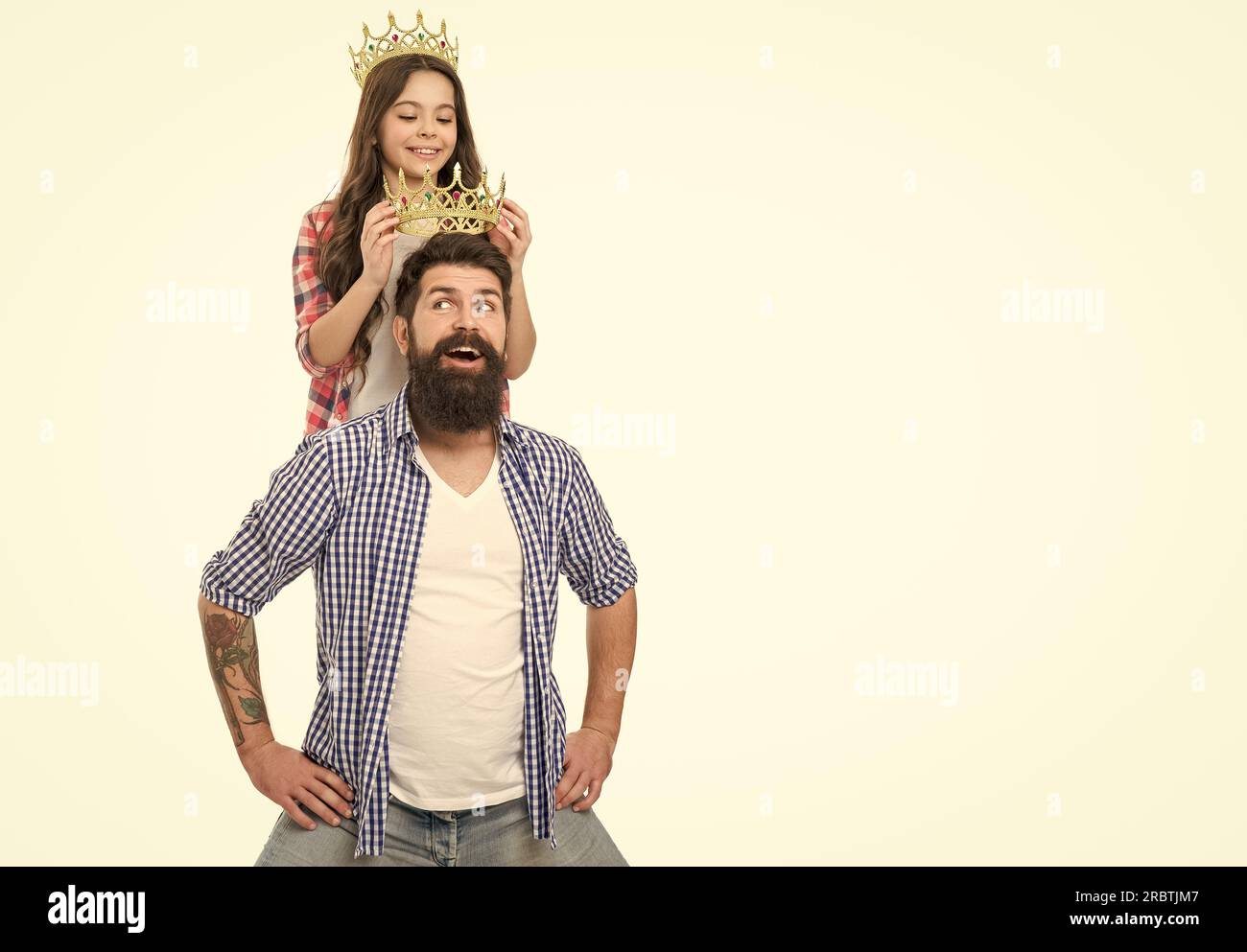 Father and kid with golden crown. We are just best. King and princess  concept. Bearded hipster and little daughter. Family heritage. Crown  richness Stock Photo - Alamy