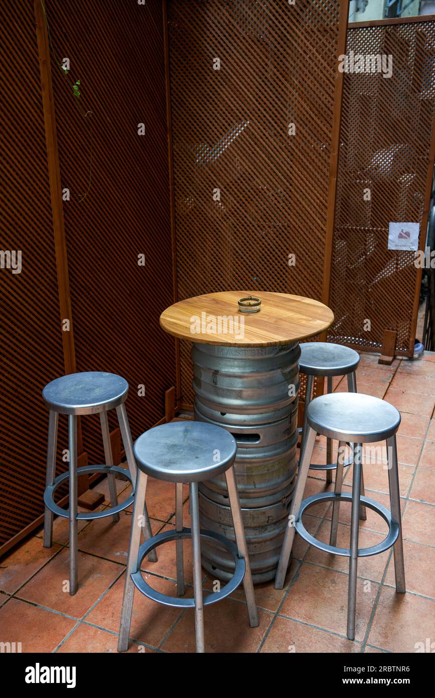 Casual dining table and chair seating in a bar in Central, Hong Kong