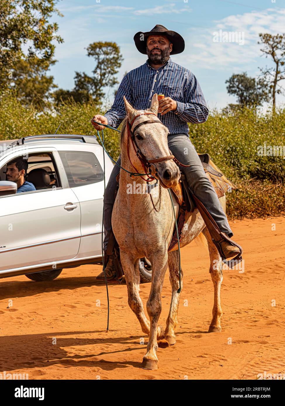 Apore, Goias, Brazil - 05 07 2023: Horseback riding event open to the public on public roads in the Brazilian city of Apore Stock Photo