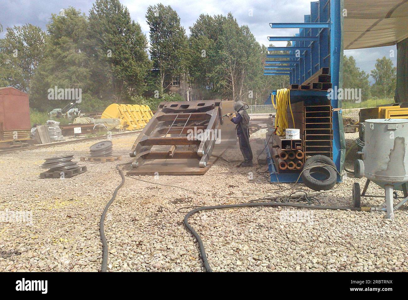 Sandblasting process. Cleaning the metal construction surface from rust