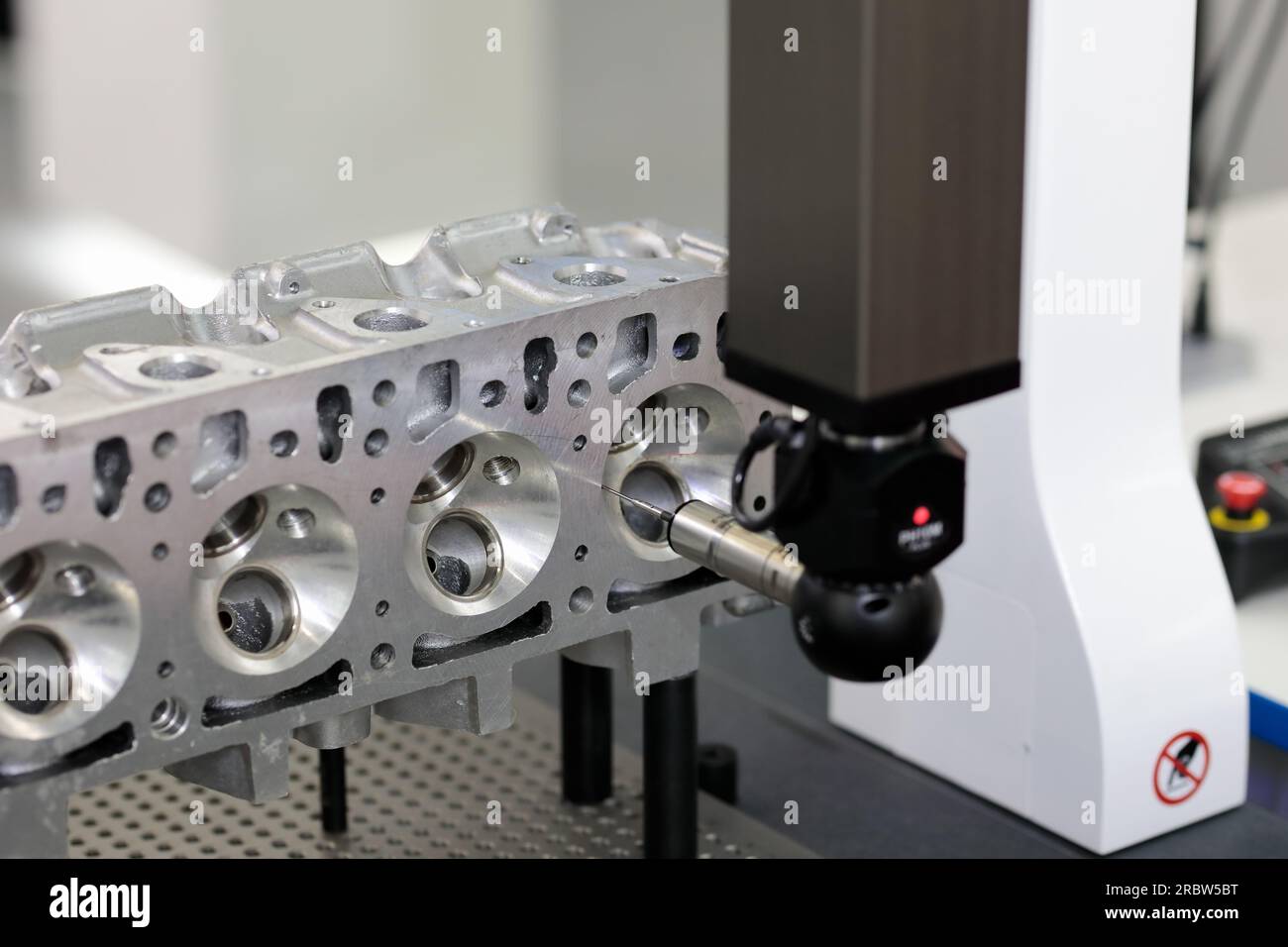 Engine dimensions inspecting on bridge CMM machine. Coordinate