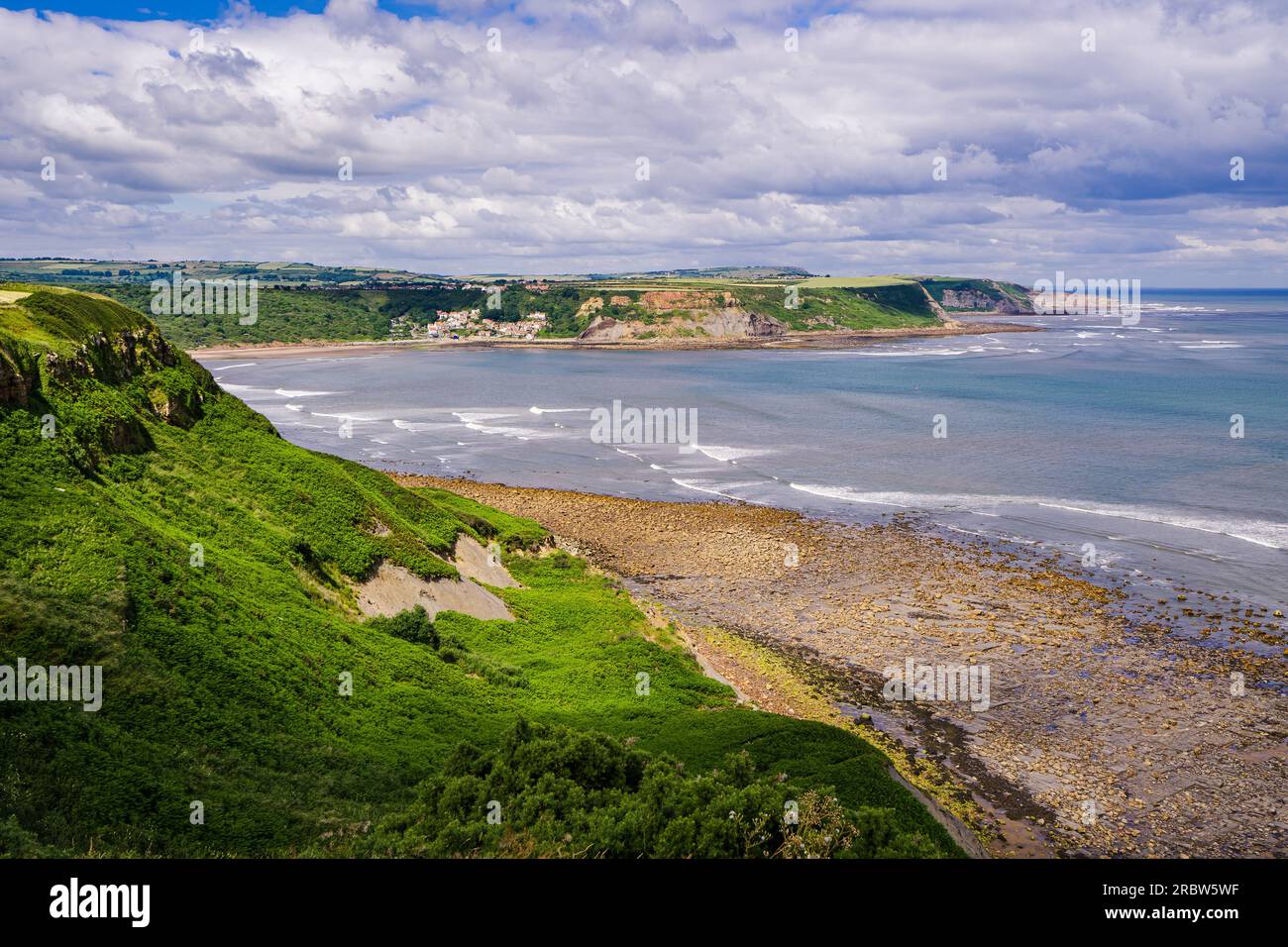 View of Runswick Bay from the clifftop at Kettleness. This is on the path which runs between Runswick Bay and Kettleness in North Yorkshire. Stock Photo