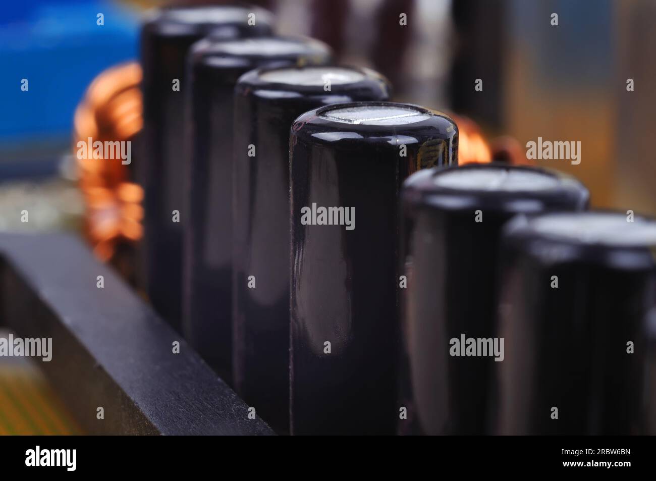 Macro of black capacitors from circuit board Stock Photo Alamy