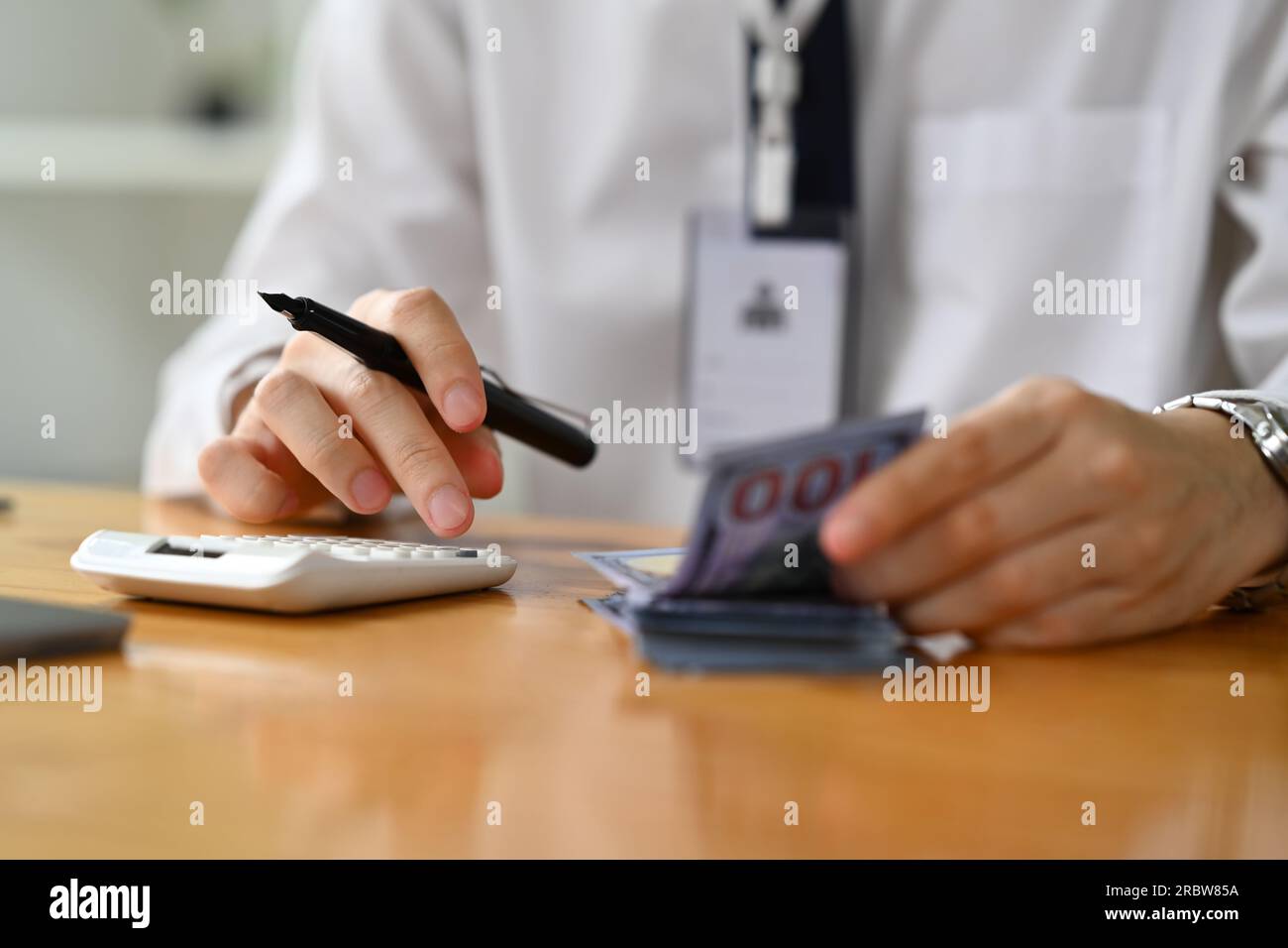 Bank banknotes person teller hi-res stock photography and images - Alamy