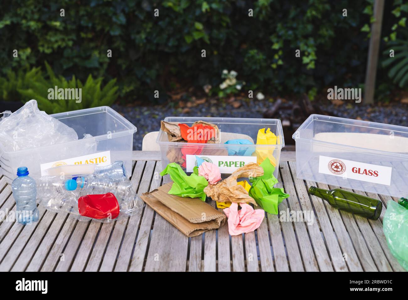 Boxes for collecting recycling and waste in garden Stock Photo Alamy
