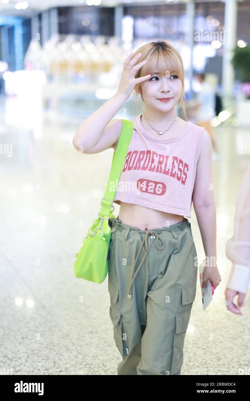 Chinese Singer Lai Meiyun appears at airport in Shanghai, China. 10th