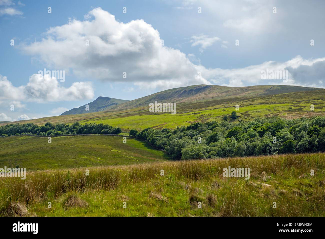 The view towards Wild Boar Fell in Cumbria and overlooking the Mallerstang Valley with its farms and villages below it  - taken from the Tommy Road Stock Photo