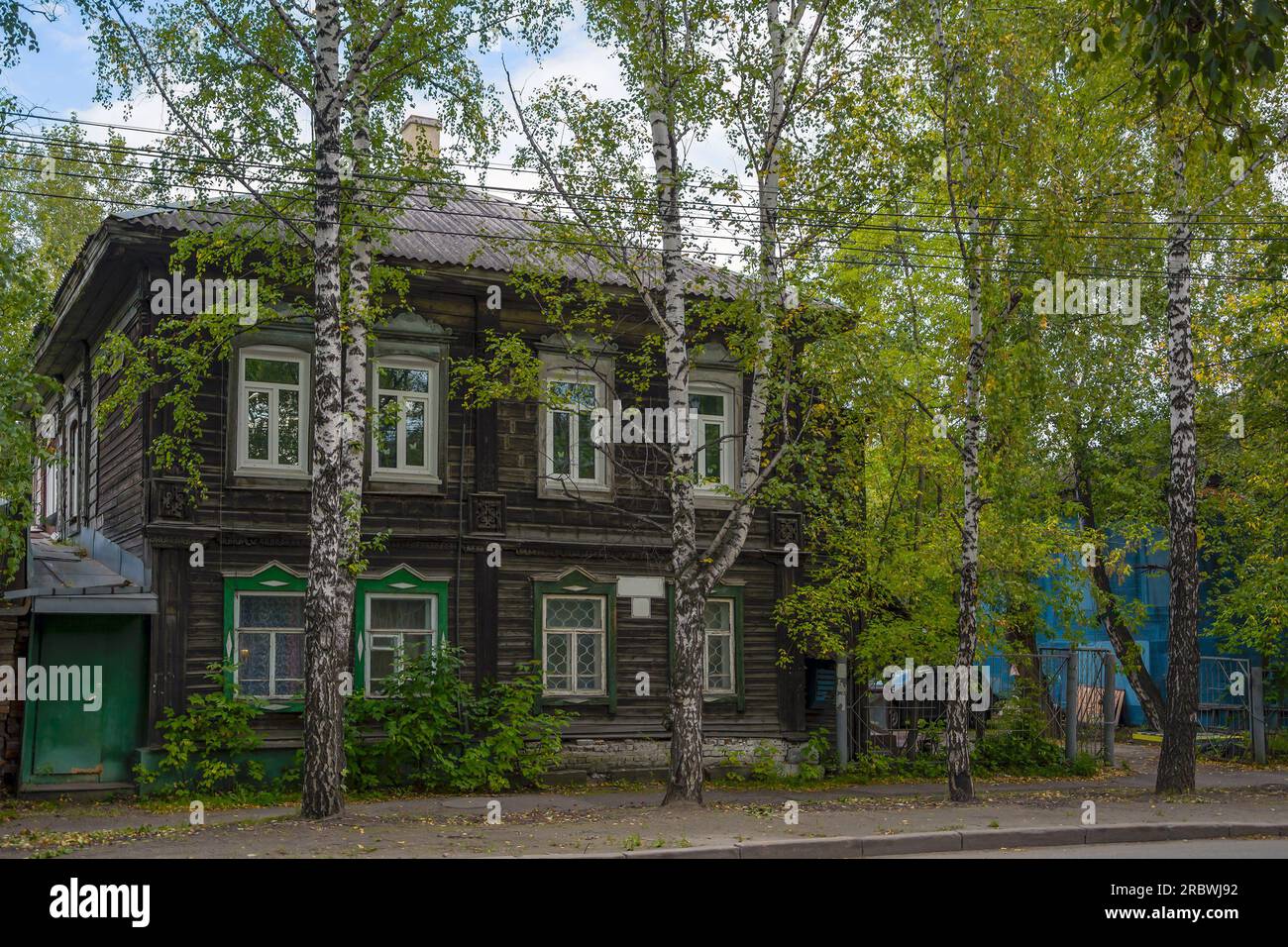 Tomsk, an old wooden apartment building on Shishkova Street Stock Photo