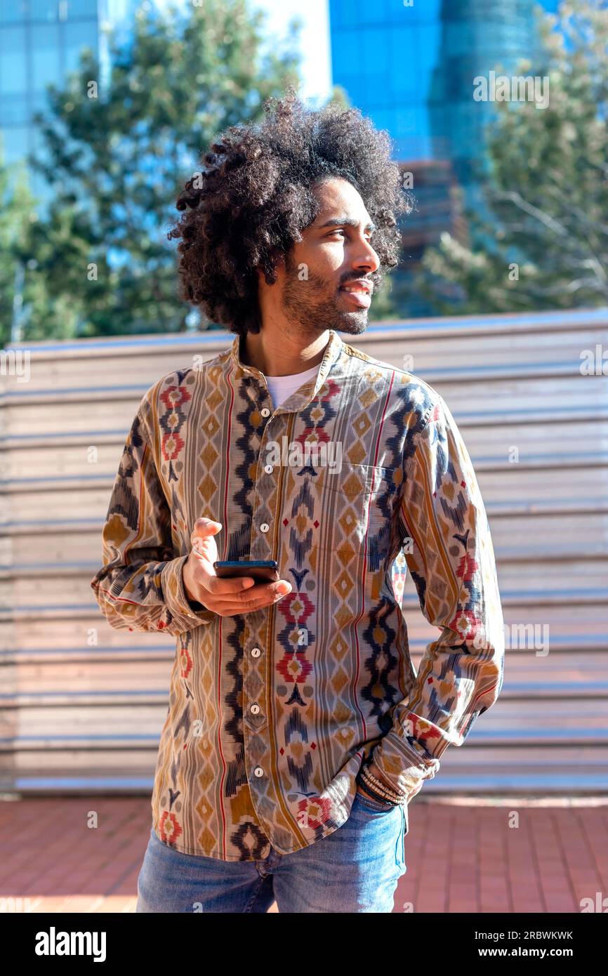 Black man afro using hi-res stock photography and images - Alamy