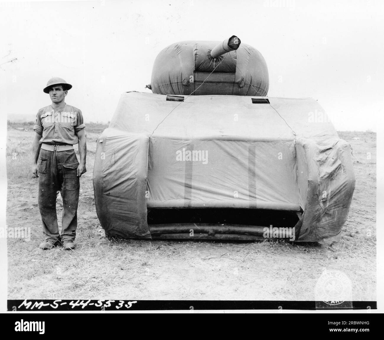 Front view of a dummy tank, specifically the British MM-5-44-5535, used for military deception during World War One. These dummy tanks were created to deceive enemy forces by appearing as operational tanks from a distance, raising questions about their authenticity and purpose. Stock Photo