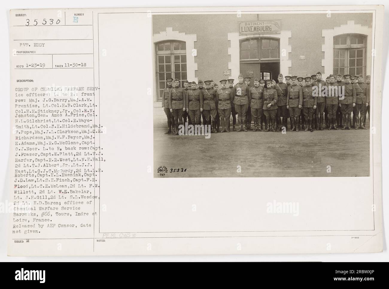 Group of Chemical Warfare Service officers posing in front of the offices of Chemical Warfare Service Barracks, #66, Tours, Indre et Loire, France. Front row (left to right): Majors J.G. Barry, A.M. Prentiss, Lt. Cols. H.B. Clark, H.H. Stickney Jr., E.N. Jonston, Gen. Amos A. Pries, Col. H.L. Gilchrist, Lt. Cols. R.Mayo-Smith, J.H. Hildebrand and several more. Captions on back row were not visible in the image. Released by AEF Censor, date not given. Stock Photo