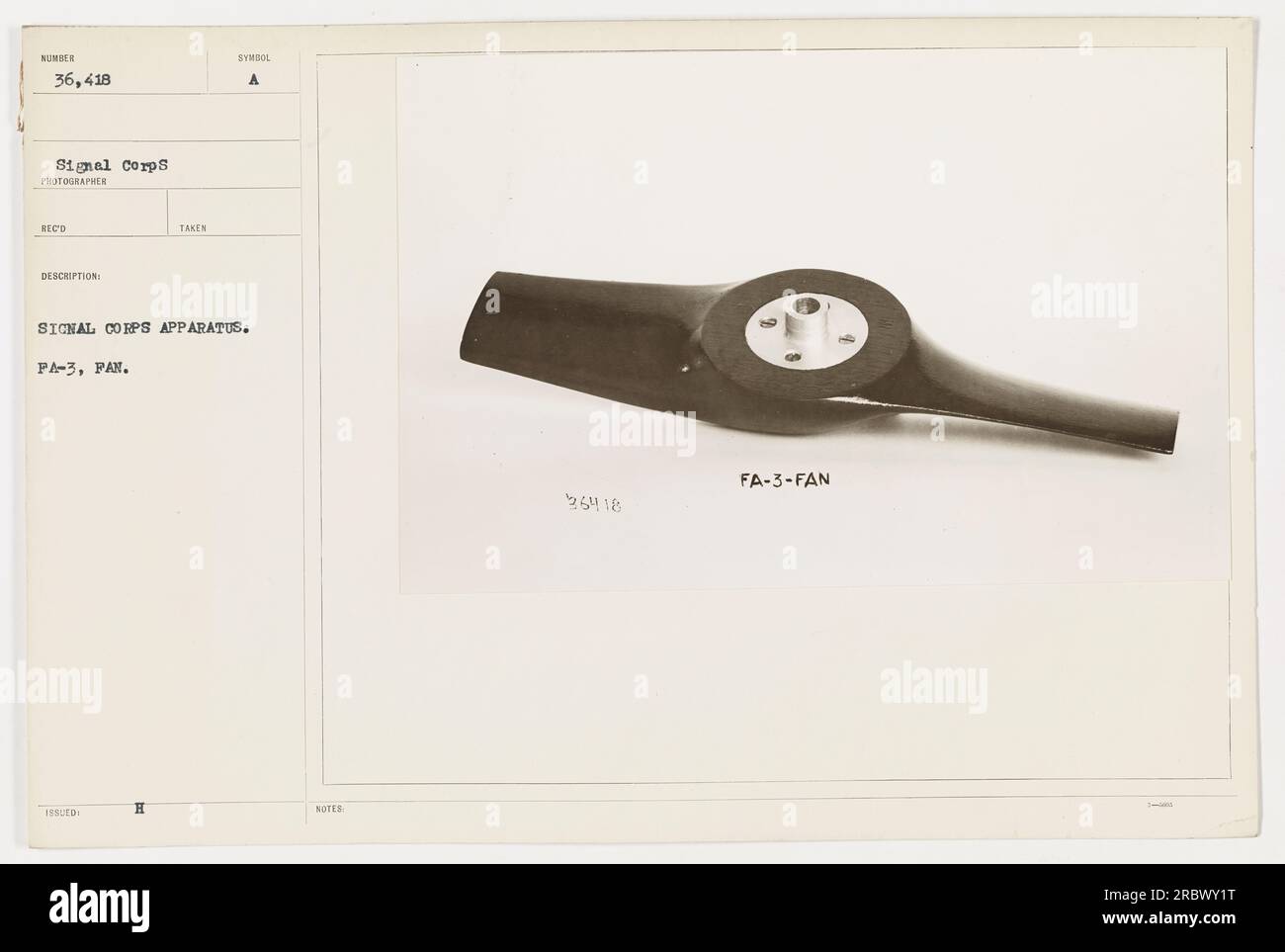 Soldiers and Signal Corps personnel operating a H-symbol apparatus