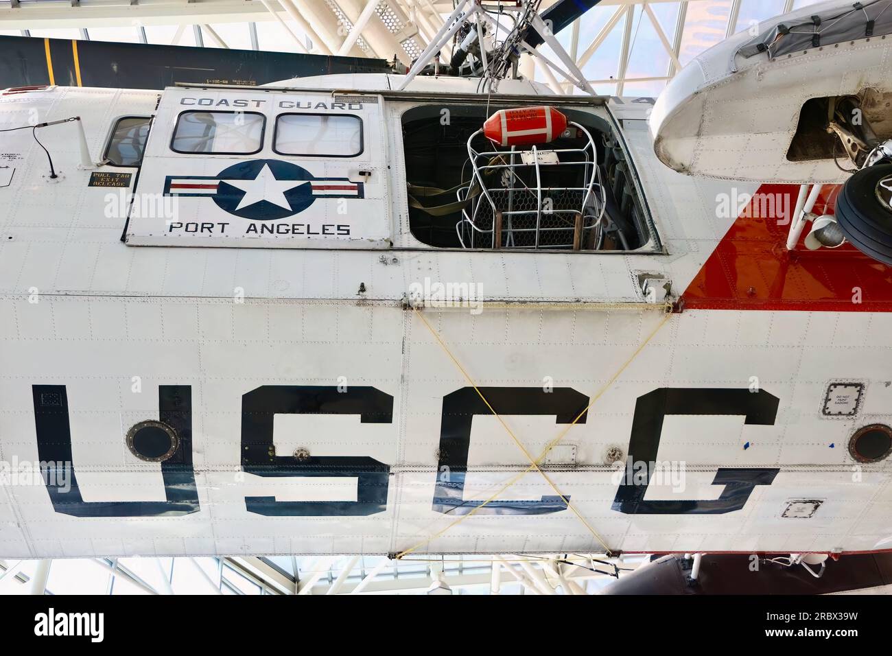 1966 Sikorsky (S-62A) HH-52A Seaguard helicopter looking up at the open door and rescue basket The Museum of Flight Seattle Washington State USA Stock Photo