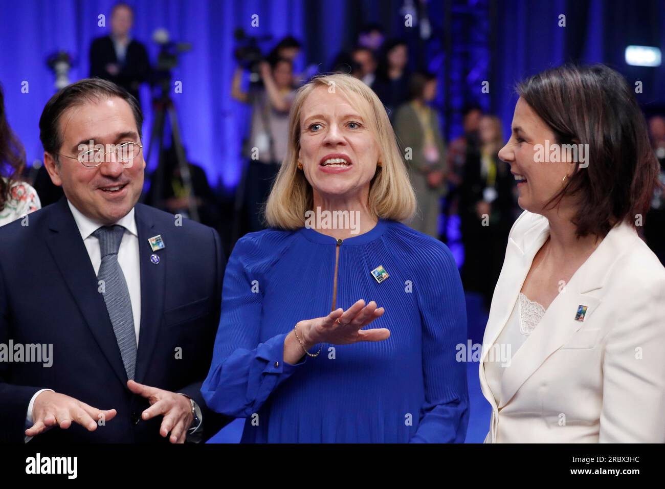 Norway's Foreign Minister Anniken Huitfeldt, center, speaks with Spain's Foreign Minister Jose Manuel Albares Bueno, left, and Germany's Foreign Minister Annalena Baerbock during a round table meeting of the North Atlantic Council during a NATO summit in Vilnius, Lithuania, Tuesday, July 11, 2023. NATO's summit began Tuesday with fresh momentum after Turkey withdrew its objections to Sweden joining the alliance, a step toward the unity that Western leaders have been eager to demonstrate in the face of Russia's invasion of Ukraine. (AP Photo/Mindaugas Kulbis) Stock Photo