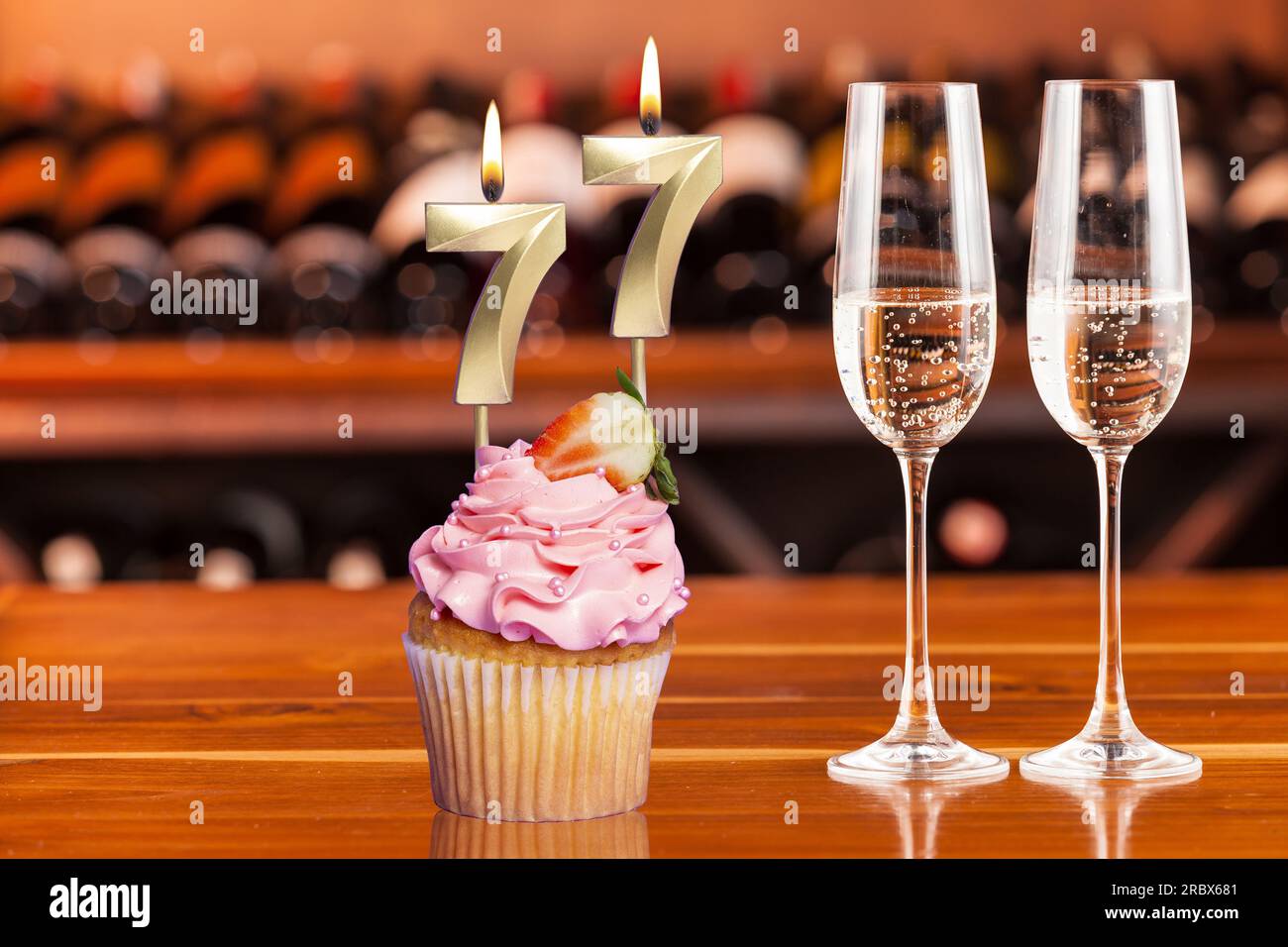 Cupcake With Number For Celebration Of Birthday Or Anniversary; Number 77. Stock Photo