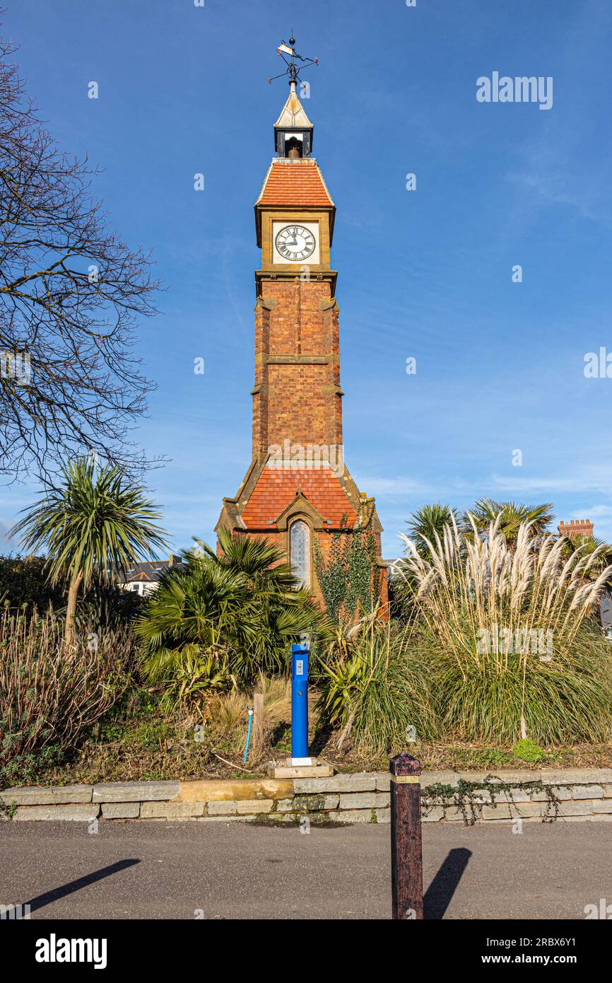 Sited on Sea Hill in Seafield Gardens, Seaton Town, Devon is the Jubilee Clock Tower built in 1887 to commemorate Queen Victorias Golden Jubilee Stock Photo