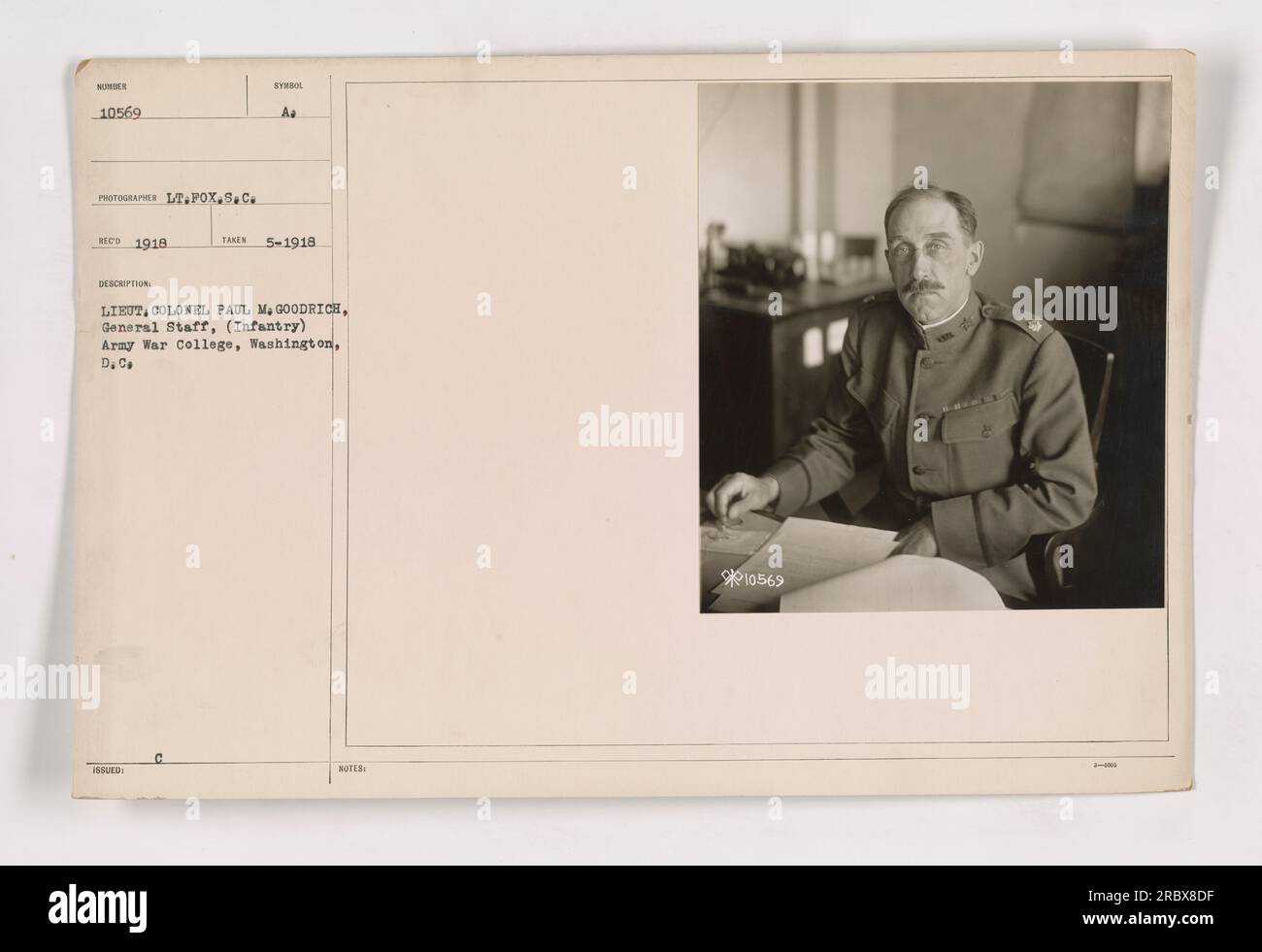 Lieutenant Colonel Paul M. Goodrich, a member of the General Staff (Infantry) at the Army War College in Washington, D.C., is pictured in this photograph taken in May 1918. The photograph was taken by Lt. Fox, and is labeled with the symbol ISSUED A₂. Noted as 10569. Stock Photo
