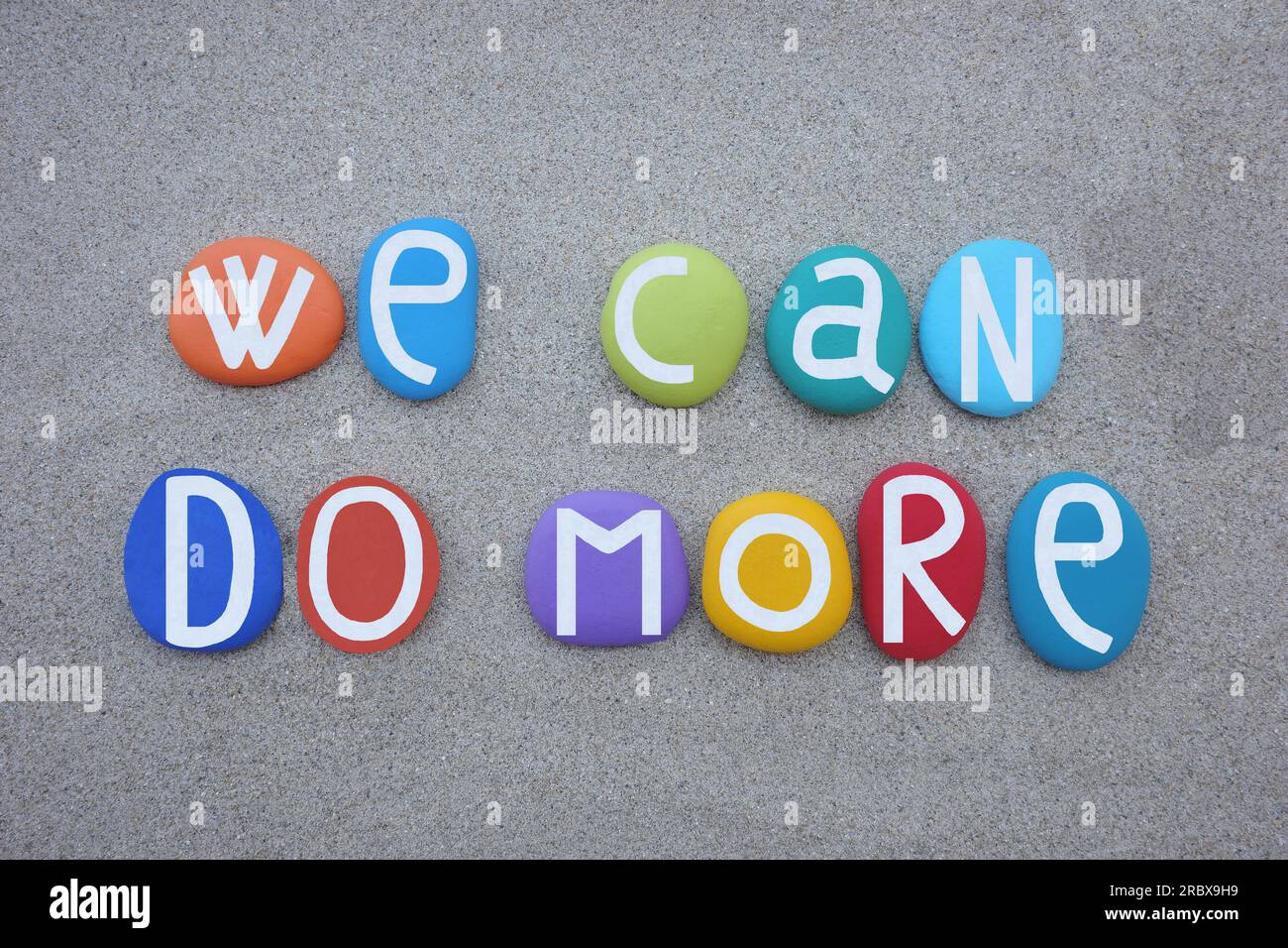 We Can We can to more, motivational slogan composed with multi colored stone ...