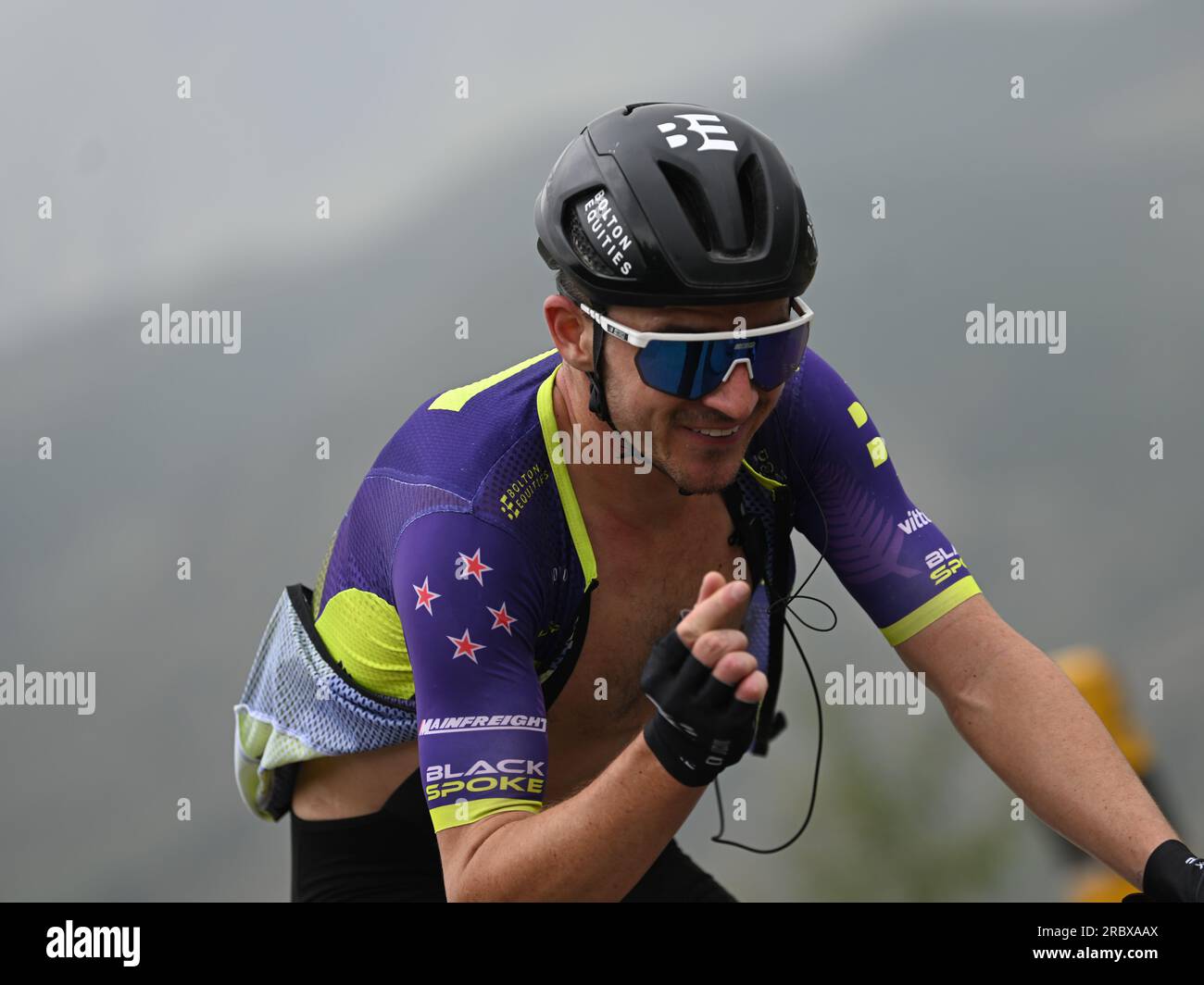 (230711) -- HUZHU, July 11, 2023 (Xinhua) -- Paul Wright of Bolton Equities Black Spoke of New Zealand competes during the stage 3 of the 22nd Tour of Qinghai Lake cycling race from Guide to Huzhu, northwest China's Qinghai Province, July 11, 2023. (Xinhua/Zhang Long) Stock Photo