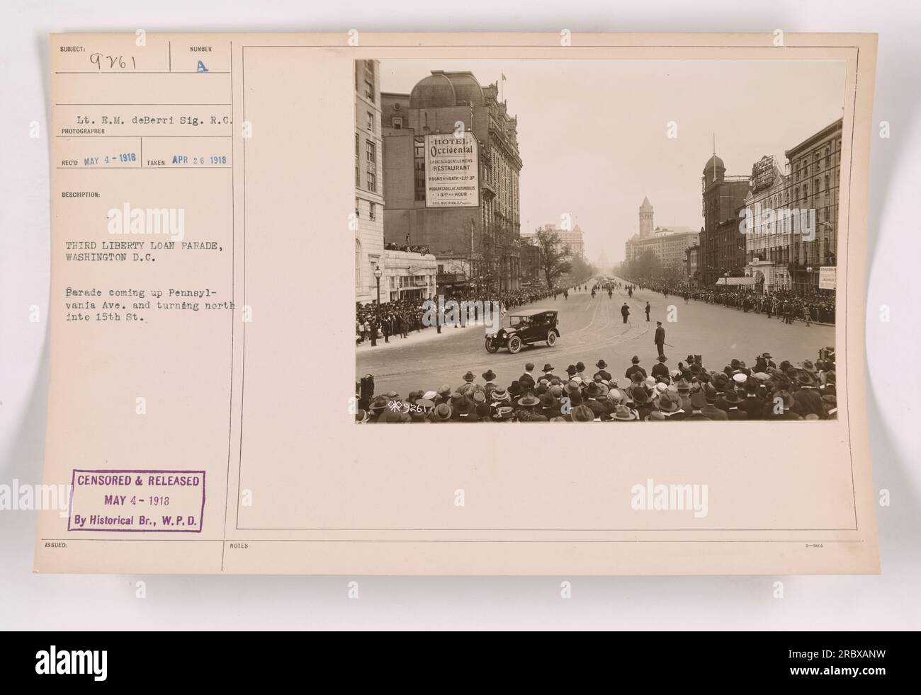 Image depicts the Assued Third Liberty Loan Parade in Washington D.C. on April 26, 1918. Lt. E.M. deBerri and Sig. R.C. of the American military are present. The parade is seen moving up Pennsylvania Ave. and turning north into 15th St. Photograph authorized and released on May 4, 1918, by the Historical Br., W.P.D. Stock Photo